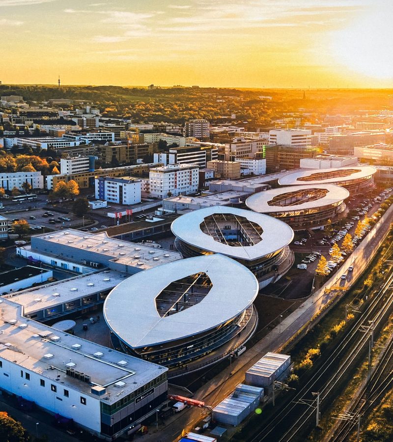 aerial-shot-of-the-white-buildings-of-wolfsburg-during-scenic-sunset-germany.jpg aerial-shot-of-the-white-buildings-of-wolfsburg-during-scenic-sunset-germany.jpg